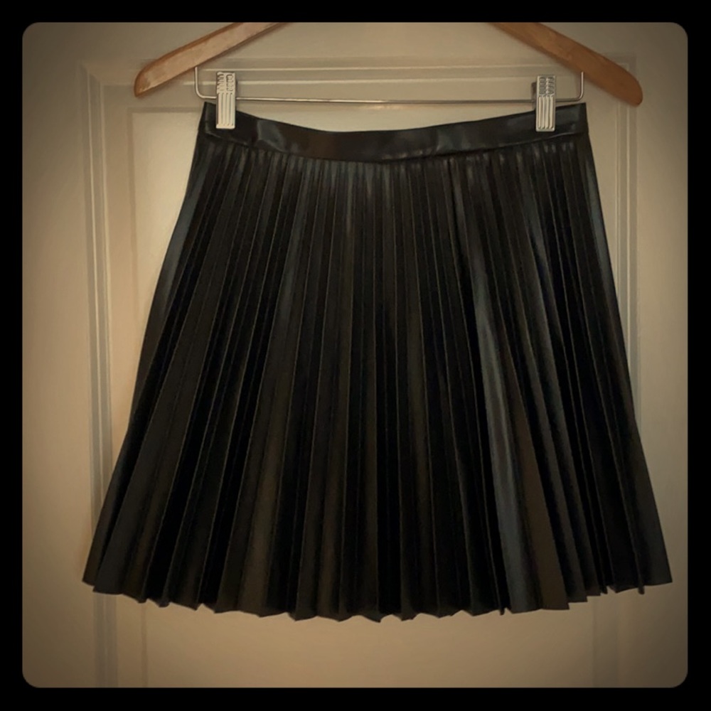 Pleated black skirt that looks like real leather